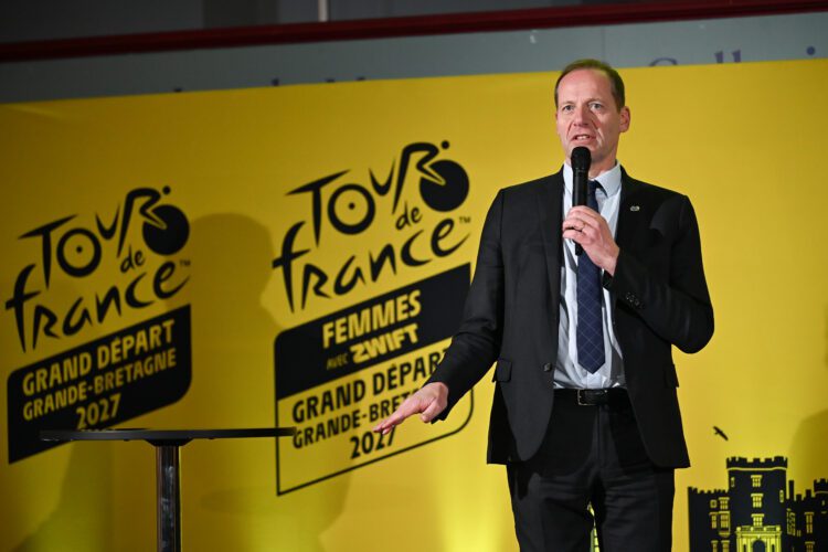 Tour de France race director Christian Prudhomme speaking on stage at the announcement.