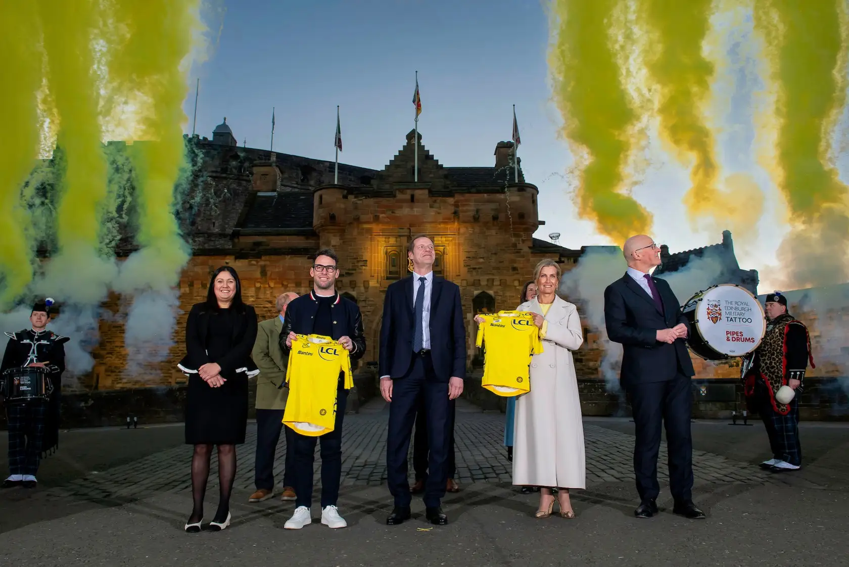 Yellow fireworks go off at Edinburgh Castle to celebrate the launch of the Tour de France Grand Dêpart